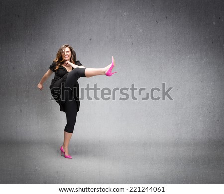 angry lady kicking with high heels empty space