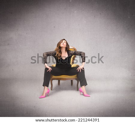 lady sitting with open legs and inviting face