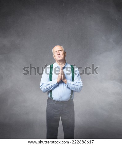 senior male pray his god for forgiveness