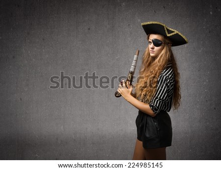 pirate blowing on an old gun
