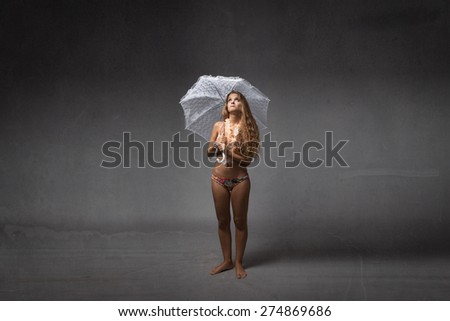 summer bad weather situation, tourist with umbrella