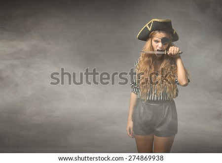 pirate biting knife with teeth, cloudy room
