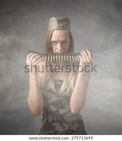 soldier biting ammunitons, cloudy room