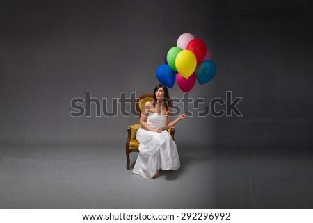 bride party with balloon on hand, dark background