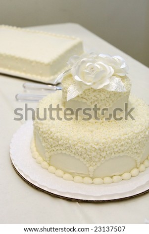 stock photo simple wedding cake at reception