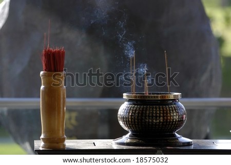 altar and joss stick in the temple