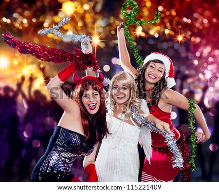 the unlike trio 06/Devil, Angel and Santa dancing in the disco