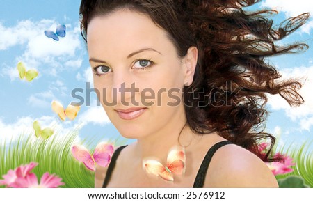 woman in a beautiful garden with flowers and butterflies