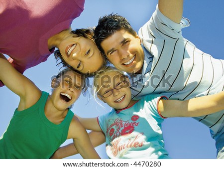 Young family is playing around on a sunny day. keyword for this collection is family7