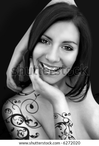 stock photo alluring woman with black ornamenttattoo