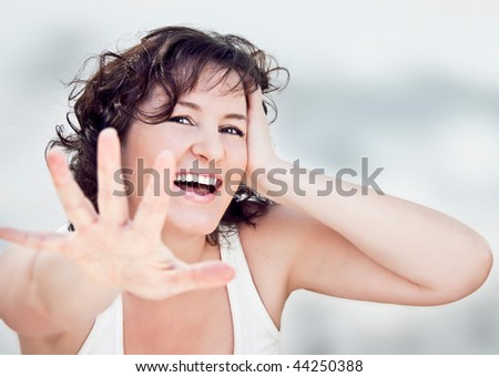 girl laughing into the camera