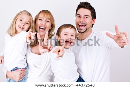 sweet young family having fun  in their home