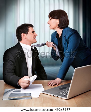 businesswoman and businessman are fighting