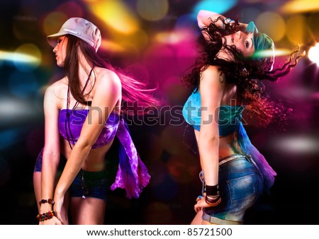 girls dancing in discolight