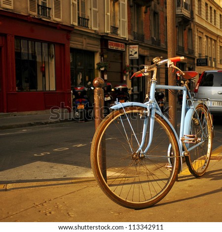 Bike standing on the street in Paris Bike standing on the street in Paris