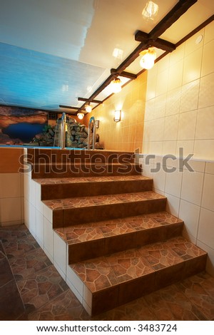 Marble stairs at pool in modern hotel