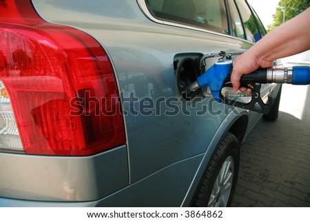 The new car on a filling station