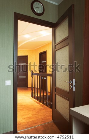 Glass door in a corridor to modern hotel