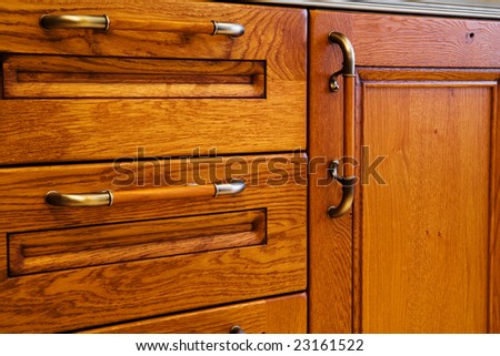 Beautiful and wooden kitchen cabinet with handles