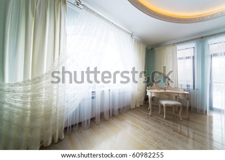 white dressing table in a large room