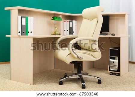 white leather armchair in a modern office