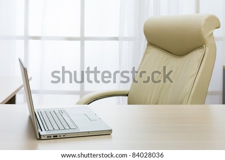 laptop on a table of director at modern office