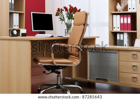 monitor on a desk in a modern office