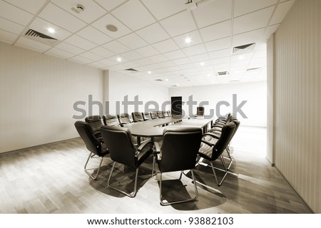 A Large Table And Chairs In A Modern Conference Room Stock Photo ...