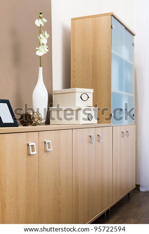 bookcase with glass doors in a modern office