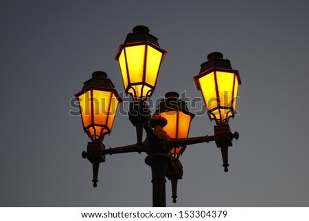 Lampposts with yellow warm light
