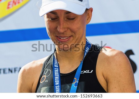 STOCKHOLM - AUG, 24: A Closeup of Anne Haug at the podium at a second place in the Womens ITU World Triathlon Series event Aug 24, 2013 in Stockholm, Sweden