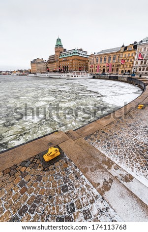 STOCKHOLM, SWEDEN - JAN 30; Nybrokajen at winter with old vintage ships at quay. 2014 in Stockholm, Sweden.