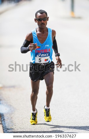 STOCKHOLM - MAY 31: Esayas Habtemicael from Eritrea later came in as number eight in ASICS Stockholm Marathon 2014. May 31, 2014 in Stockholm, Sweden.