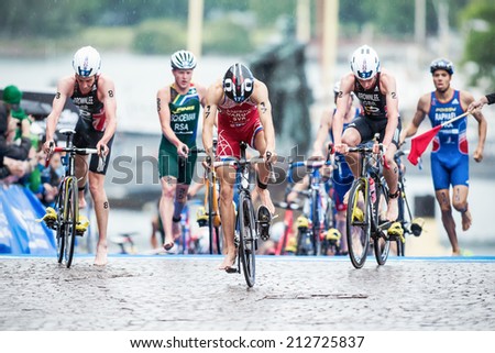 STOCKHOLM - AUG, 23: The leaders after the transition to cycling with Varga and the Brownlee brothers at the Mens ITU World Triathlon Series event August 23, 2014 in Stockholm, Sweden