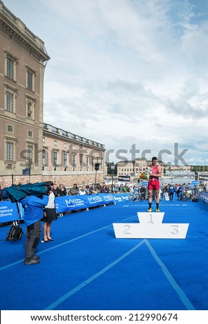 STOCKHOLM - AUG, 23: The overall leader Javier Gomez in the Mens ITU World Triathlon Series event August 23, 2014 in Stockholm, Sweden. Alistair Brownlee got the second place.