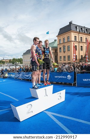 STOCKHOLM - AUG, 23: The three men at the podium in the Mens ITU World Triathlon Series event August 23, 2014 in Stockholm, Sweden. Alistair Brownlee got the 2 place. Brownlee, Brownlee and Buchholz