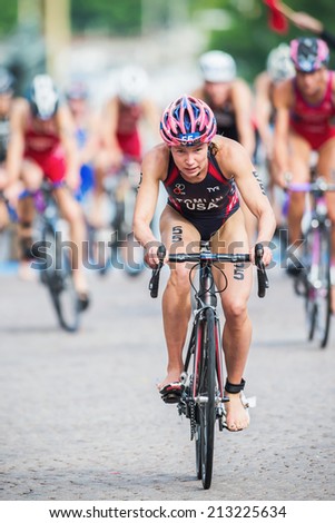 STOCKHOLM - AUG, 23: Renee Tomlin from USA after the transition to cycling at the Womans ITU World Triathlon Series event August 23, 2014 in Stockholm, Sweden
