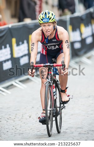 STOCKHOLM - AUG, 23: Chelsea Burns from USA after the transition to cycling at the Womans ITU World Triathlon Series event August 23, 2014 in Stockholm, Sweden