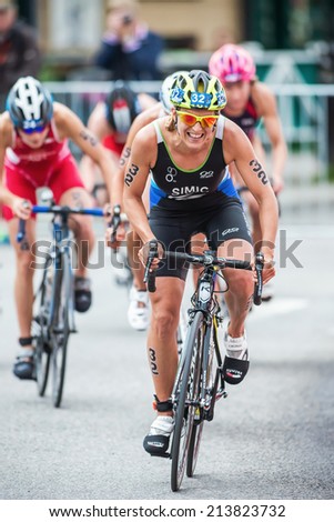 STOCKHOLM - AUG, 23: Mateja Simic from Slovakia first in a group cycling in the Womans ITU World Triathlon Series event August 23, 2014 in Stockholm, Sweden