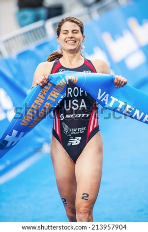 STOCKHOLM - AUG, 23: Winner Sarah Groff from USA crossing the finish line in the Womens ITU World Triathlon Series event  Aug. 23, 2014 in Stockholm, Sweden