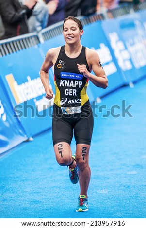 STOCKHOLM - AUG, 23: Anja Knapp from Germany running to the finish line in the Womens ITU World Triathlon Series event  Aug. 23, 2014 in Stockholm, Sweden