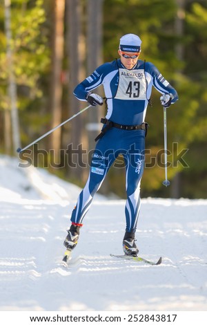 STOCKHOLM - FEB 15: Closeup of a top ski runner after the first lap in the Stockholm ski marathon in cross country skiing, february 15, 2015 in Stockholm, Sweden. Stockholm Ski Marathon 46 km