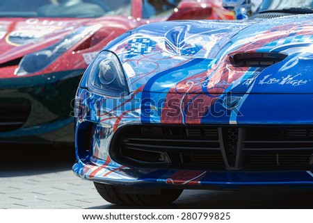 STOCKHOLM, SWEDEN - MAY 23: Gumball 3000 custom car at display on the streets of Stockholm on May 23, 2015. People at the streets admiring the exotic cars at display.