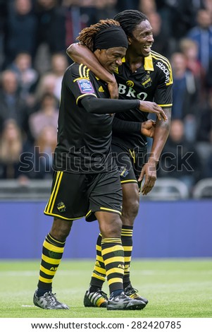 STOCKHOLM, SWEDEN - MAY 25: AIK striker Mohammed Bangura celebrating with Ofori after his goal in the game DIF vs AIK at Tele2 arena on May 25, 2015. Bangura scored the 0-2 goal.
