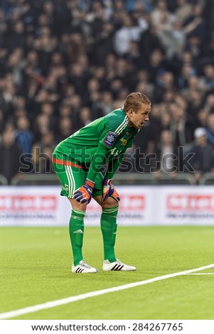 STOCKHOLM, SWEDEN - MAY 25: Goalkeeper of AIK, Patrik Carlgren after a goal in the back in the game of DIF against AIK at Tele2 arena on May 25, 2015. Nils Johansson scored one goal during the match.