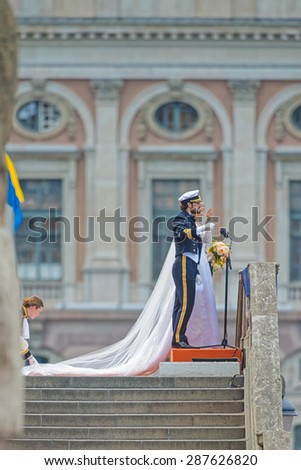 STOCKHOLM - JUN 13, 2015: Prince Carl-Philip having a speech to the public after the Royal wedding with  Princess Sofia.