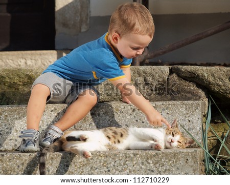 Little boy with cat