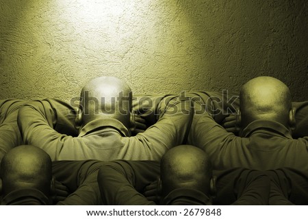 A bald man leaning face into a wall with his clones all around him in murky green monochrome
