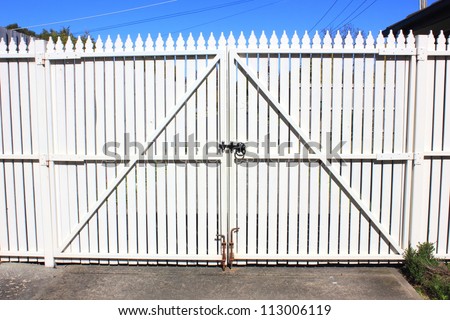 Picket fence gates in a suburban backyard drive way in australia