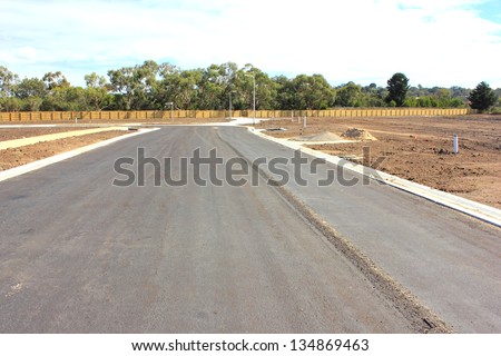 New road and footpaths in the making in a newly subdivided housing estate in suburban australia